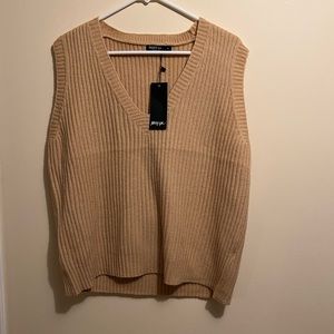 Ribbed V neck sleeveless sweater vest from NastyGal